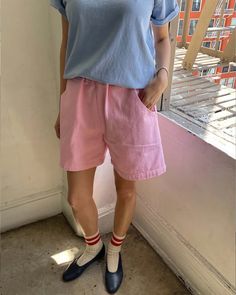 model wearing bubblegum pink cotton shorts with side pockets and elastic waistband Summer Wide Leg Shorts With Built-in Shorts, Wide Leg Shorts With Built-in Shorts, Solid Color Jean Shorts With Pockets, Trendy Wide Leg Shorts In Solid Color, Spring Bottoms With Side Pockets For Everyday, Trendy Wide Leg Shorts, High Waist Jean Shorts With Side Pockets For Summer, Spring Bermuda Pants With Side Pockets, Summer Bermuda Shorts With Pockets For Day Out