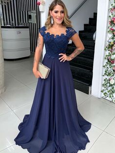 Mother of the Bride Dress Navy Blue Chiffon Long Scoop A-Line 2025 is made-to-order by professional tailors. You can choose from 40+ colors and sizes 2 to 16W. This chic dress is also perfect as your wedding guest dress. Product Details: Silhouette: A-Line/Princess ;Season: Spring , Summer , Fall , Winter ;Fabric: Chiffon ;Neckline: Scoop ;Waist: Natural ;Sleeve: Sleeveless ;Embellishment: Lace ;Back Model: Other ;Hem/Train: Sweep/Brush Train ;Shown Color: Navy Blue Evening Dresses Long Elegant Navy Blue, Navy Blue Prom Dresses, Mother Wedding Dress, Bride Groom Dress, Mothers Dresses, Wedding Dress Shopping, Groom Dress, Prom Dresses Blue, Evening Gowns Formal