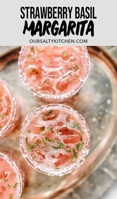 strawberry basil margaritas on a silver platter with text overlay