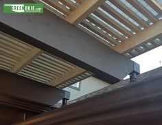 the roof of a building with wooden slats on it