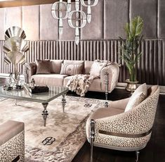 a living room filled with furniture and a chandelier