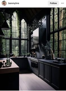 an image of a kitchen setting with dark colors