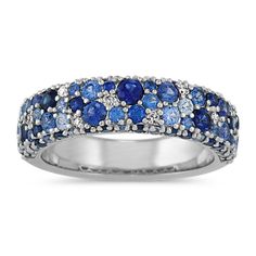 a white gold ring with blue sapphires and diamonds