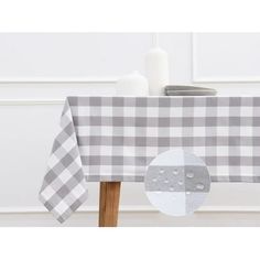 a table topped with a gray and white checkered table cloth