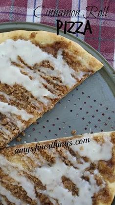 a slice of cinnamon roll pizza on a plate with the rest of it cut in half