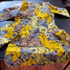 Batik Thai Or African Ankara Dress, Headscarf And Matching Mask. New, Never Worn. Previous Seller Indicated Cotton & Feels To Be Cotton. Size Is A Medium (Marked Xl) 36" Bust 40" Hip Side Slits Approx. 3". Excellent Condition. Reposhing Because I Never Wore It. Yellow Cotton Dress With Batik Print, Yellow Batik Print Dresses, Traditional Yellow Floral Print Dress, Traditional Yellow Dress With Batik Print, African Fabric Dress, African Ankara, Ankara Dress, African Fabric, Head Scarf