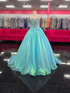 This Sugar Kayne C334 Pageant Dress features a luxurious iridescent organza long ball gown skirt and a crystal sweetheart neckline, designed specifically for that "Wow" effect. An detachable cape with fringe on a cap sleeve Cape embellished with /A/B Crystals throughout. Sizes: 6 Colors Mermaid Blue *ONE OF A KIND GOWN Organza Ball Gown With Fitted Bodice For Quinceanera, Sweet 16 Blue Gown With Sweetheart Neckline, Blue Gown With Sweetheart Neckline For Sweet 16, Blue Sweetheart Neckline Gown For Sweet 16, Sweet 16 Organza Ball Gown, Blue Ball Gown With Fitted Bodice For Sweet 16, Princess Style Organza Ball Gown For Debutante Ball, Party Quinceanera Dress With Fitted Bodice In Organza, Quinceanera Dress With Fitted Bodice In Organza For Party