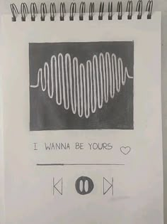 a spiral notebook with the words i wanna be yours written on it