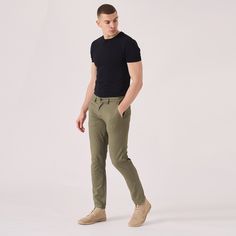 "Introducing our stylish Regular Fit Stretch Chino Trouser in a refreshing Light Green shade. Designed for both comfort and style, these trousers are made with a stretch fabric to ensure a perfect fit. Ideal for any occasion, dress them up or down with ease. The classic chino design features an adjustable waistband and button closure for a secure and tailored look. Upgrade your wardrobe with these versatile and trendy chinos that will give you a polished and effortlessly cool vibe. Product Features: Light Olive Green Stretch Fabric Regular chino fit Tonal buttons Welt pockets to back 98% cotton 2% spandex Our Model is 5'11\" and wears size 32. To find the perfect fit for yourself, check our Size Guide FIND YOUR SIZE and check our size guide to find your perfect fit. Size = 30 - 40 Waist = Green Casual Pants For Business Casual Occasion, Green Casual Pants For Business Casual, Green Casual Bottoms For Business Casual, Khaki Casual Bottoms For Business Casual, Khaki Chinos For Business Casual, Khaki Casual Chinos For Business Casual, Casual Green Chinos With Welt Pockets, Green Business Casual Chinos