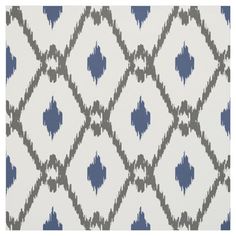 a blue and white pattern on fabric