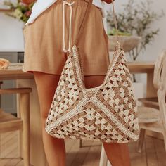 Hit The Beach With Our Cabana Tan/Ivory Hobo Tote! This Two Tone Woven Hobo Tote Bag Features A Faux Leather Strap And Comes In A Crochet Woven Straw Design. Paper/Polyester Blend. Zipper Closure. 1 Inside Open Pocket. 1 Inside Zipper Pocket. Chic Sand-colored Summer Shoulder Bag, Summer Beige Tote Shoulder Bag, Beige Shoulder Bag For Vacation, Beige Tote Shoulder Bag For Vacation, Summer Style Sand-colored Shoulder Bag, White Hobo Tote Bag For Beach, White Tote Hobo Bag For Beach, Beige Rectangular Hobo Bag For Beach Season, Beige Vacation Bag With Braided Handles