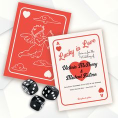 two dices are next to a card and some cards with the words lucky in love on them