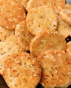 some fried food on a plate with sesame seeds