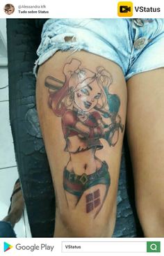 a woman with a tattoo on her thigh