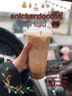 a woman holding up a cup of coffee in her hand with the caption, snickkerdoodle drink