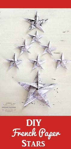 the diy french paper stars are made from newspaper strips and have been placed on top of