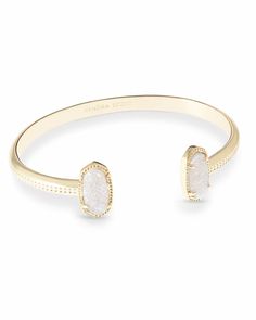 A dainty pinch cuff bookended with our signature oval stones, the Elton Gold Cuff Bracelet in Iridescent Drusy is a stack staple. This beautifully designed gold cuff bracelet is guaranteed to turn heads every time you wear it. No matter the size of your wrist, our Elton Cuff Bracelet is sure to fit you and your style. Kendra Scott Bracelet, 2024 Christmas, Kendra Scott Jewelry