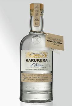 a bottle of karukera liquene with a tag on the side