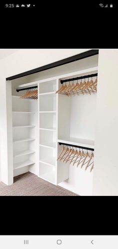 a white closet with shelves and clothes hanging on the hooks, in front of an instagram page