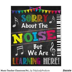 a chalkboard sign that says sorry about the noise but we are learning here with music notes