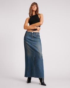 The DENIM COLUMN SKIRT is a low to mid waist maxi skirt semi fitted through the hips. Featuring a centre front split and a zip fly.   Crafted from our USED BLUE denim wash - a classic lightweight, super-distressed, blue on blue dirty indigo classic denim.   Model wears a size 26 (size 4 USA or size 8 UK/AUSTRALIA). Denim Skirts Online, Denim Skirt Fashion, Womens Denim Skirts, Adventurous Women, Denim Skirt Outfits, Column Skirt, Denim Skirt Women, Denim Skirts, One Teaspoon