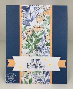 a birthday card with flowers on it and a ribbon around the edge that says happy birthday