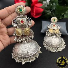 Gorgeous Jhumka in brass plating with 92.5 silver Polished and has real Pachi work. Ready to ship from New Jersey , United StatesMetal: Brass Size: BigNickel FreePerfect for all occasion(Party, Wedding ,Engagement)HandcraftedReady to ship from New Jersey , United StatesHighest quality and craftsmanship Long Earrings Silver, Trendy Jewellery, Long Silver Earrings, Jewellery Earrings, Red Turquoise, Fashion Jewelry Earrings, Green Turquoise, Trendy Jewelry, Fashion Jewellery