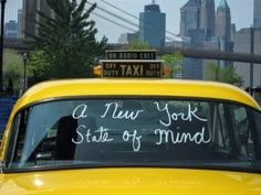 a taxi cab with the words a new york state of mind written on it