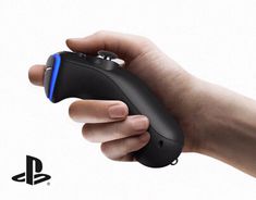 a hand holding a video game controller in it's right hand and the sony logo on the left