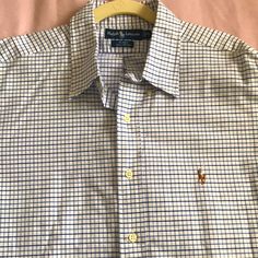 Brand New With Tags, Ralph Lauren Long Sleeve Polo Shirt. 100% Cotton. White, Dark Blue And Light Blue. Great Buy. Smoke Free Home. Ralph Lauren Plaid Collared Tops, Ralph Lauren Collared Plaid Tops, Blue Ralph Lauren Shirt, Classic Ralph Lauren Cotton Dress Shirt, Blue Cotton Ralph Lauren Polo Shirt, Ralph Lauren Button-up Shirt With Button Closure, Red Plaid Dress, Ralph Lauren Plaid Button-up Shirt, Button Up Shirt Mens