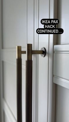 an image of a door handle that is in front of a white door with the words ikea pax hack continues