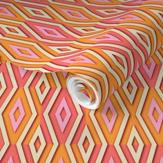 an orange, pink and yellow wallpaper with wavy lines on it's surface