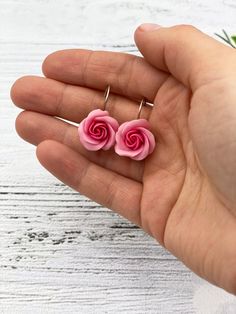 Beautiful pink rose earrings for every lovely day. The life of the real roses is too short to make some flower earrings with them. Instead of real flowers, I offer you these beautiful handmade flowers that will never fade. Such a piece of floral jewelry can please you for many years. They will beautifully adorn your look in any season of the year. Details: * Designed with handmade flowers out of cold porcelain (air dry clay); * Diameter of the roses 0.6 inches (1.5 cm); * Base color will be made Dainty Pink Flower Charm Earrings, Pink Flower Earrings With Rose Design, Pink Cute Earrings With Handmade Flowers, Rose Red Flower Earrings With Rose Design, Rose Red Flower-shaped Earrings With Rose Design, Rose Red Flower Earrings, Pink Handmade Flower Drop Earrings, Cute Pink Flower Earrings With Handmade Flowers, Delicate Pink Flower Earrings For Gift