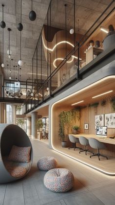 the interior of an office building with circular seating and lights on the ceiling, along with round bean chairs