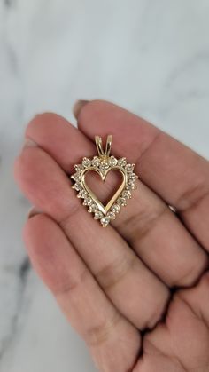 ♥ Product Summary ♥Main Stone: DiamondsDiamond Cut: RoundMetal Choice: 14K Yellow GoldDimensions: 28mm x 20mmWeight: 5 grams Heart Necklace, Diamond Cuts, Necklace Lengths, Yellow Gold, Yellow, Stone, Gold