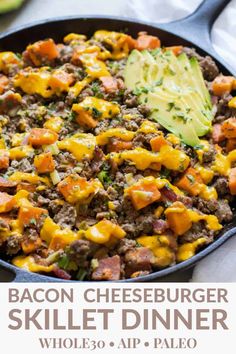 the bacon cheeseburger skillet dinner with avocado and sour cream on top