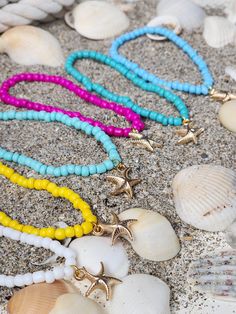 Cute Beachy, summer ready, charm bracelet to spruce up your style this summer. Handcrafted with love using seed beads and elastic cords. Pairs well with other stackable bracelets. Colorful Beads Starfish Bracelet For Beach, Turquoise Beaded Starfish Bracelets For Summer, Turquoise Starfish Beaded Bracelets For Summer, Summer Turquoise Beaded Bracelets With Starfish Shape, Star-shaped Summer Beach Jewelry, Summer Beach Bracelets With Tiny Beads, Summer Vacation Beaded Bracelets With Starfish Shape, Tiny Beads Bracelets For Summer Beach, Starfish Shaped Beaded Bracelets For Beach Season