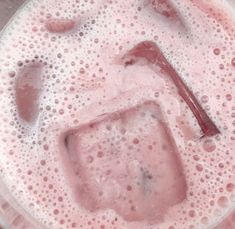 a blender filled with pink colored liquid