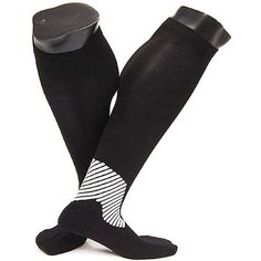 Take your training to the next level with the Lian LifeStyle compression knee high sport socks. Made with Compression Fit Technology, these knee-high sports socks can boost your muscle containment while graduated fit increases circulation and cuts down on shin splints. An specially engineered footbed to supports the Achilles and adds comfort in the ball and heel of the foot. Great for any sport practice or games and can speed up the recovery process after a taxing workout or training session. Ot Sporty Protective Gym Socks, Sporty Black Running Socks, Breathable Sporty Socks For Sports, Functional Black Sports Socks, Black Protective Sports Socks, Black Breathable Training Socks, Breathable Black Socks For Training, Sporty Breathable Socks For Workout, Breathable Black Training Socks