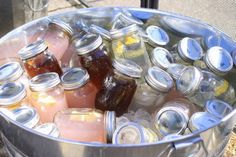 a bucket filled with lots of different kinds of drinks