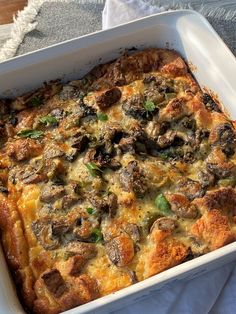 a casserole dish with meat and vegetables in it