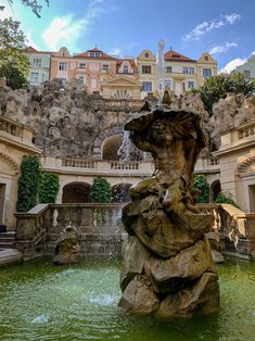 a fountain in the middle of a large building