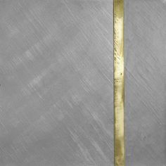 a square metal plate with a gold stripe on the edge and a plain white background