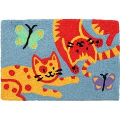 a door mat with cats and butterflies on it