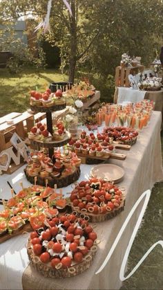 a table with many different types of food on it