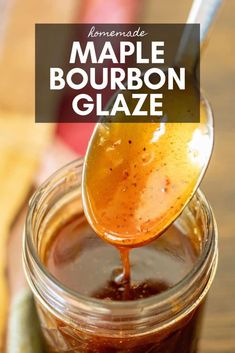 homemade maple bourbon glaze in a mason jar with a spoon scooping out the liquid