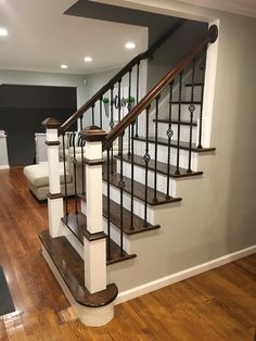 the stairs in this house are made of wood and metal