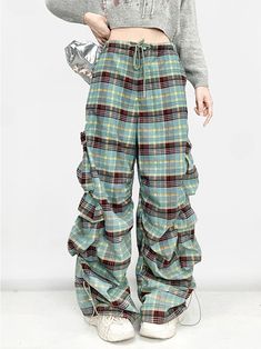 These pants feature an all-over plaid pattern and come with cargo pockets. Designed in a straight-leg fit, they are perfect for flattering the leg shape and providing a slimming effect. The sides of the legs are adorned with ruched detailing for added style.  The price includes only one pair of pants.   	 		 			Size 			S 			M 			L 		 		 			Waist 			64 			68 			72 		 		 			Length 			104 			105 			106 		 		 			Hips 			92 			96 			100 Patched Pants, Steampunk Fashion Female, Patch Pants, Pu Skirt, Steampunk Fashion Male, Gothic Skirts, Leg Sleeves, Bubble Skirt, Purple Plaid