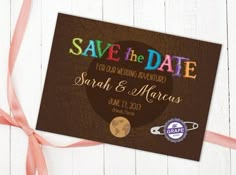 save the date card with ribbon on top