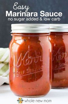 two jars filled with marinara sauce sitting on top of a white tablecloth and text overlay reads easy marinara sauce no sugar added & low carb